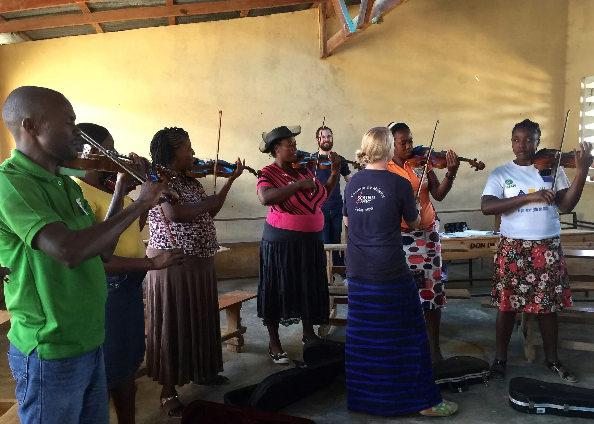 Violin class in Tilori, Haiti, led by Mallory Alekna of Indiana University