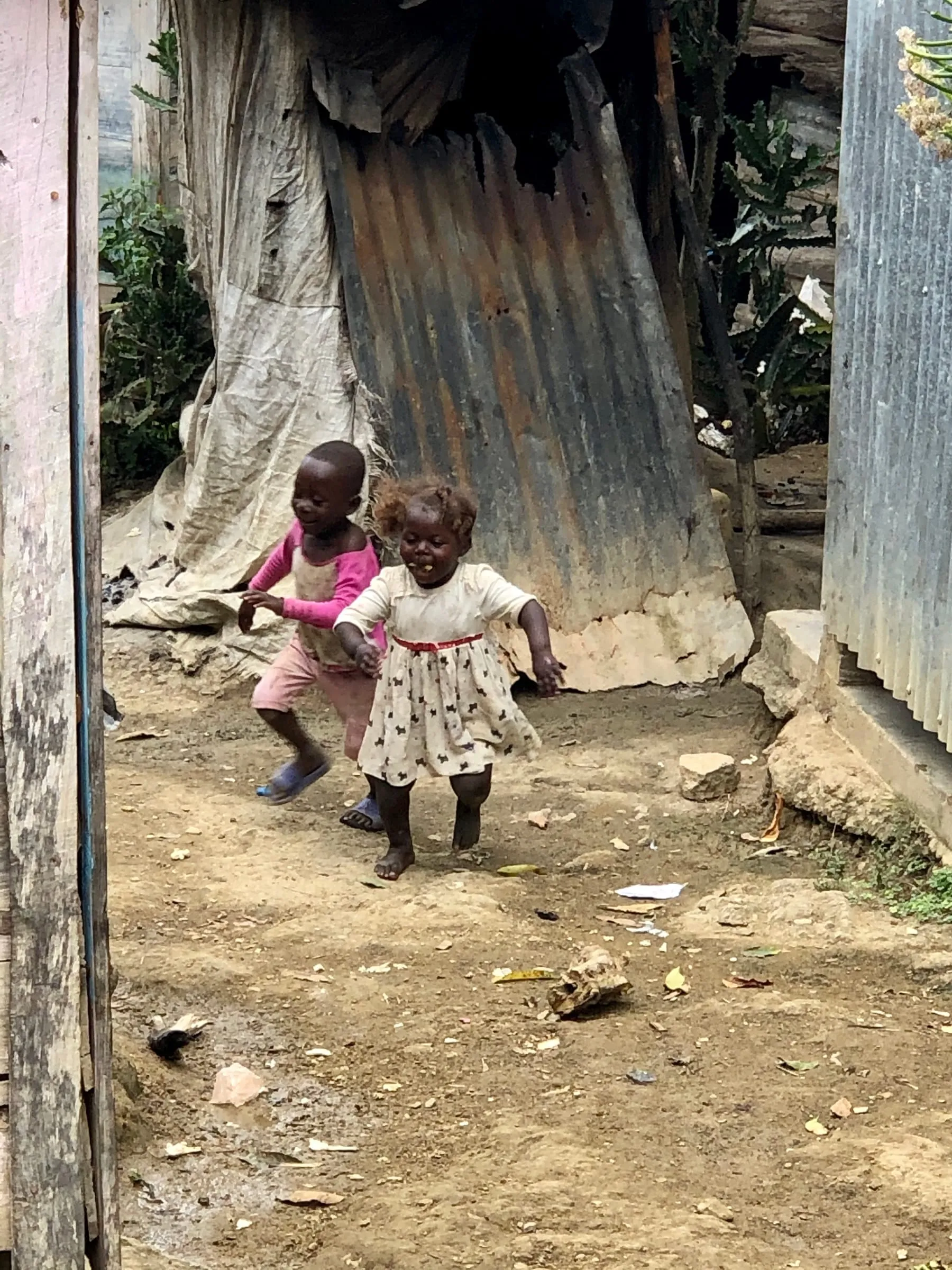 Children playing outside a home