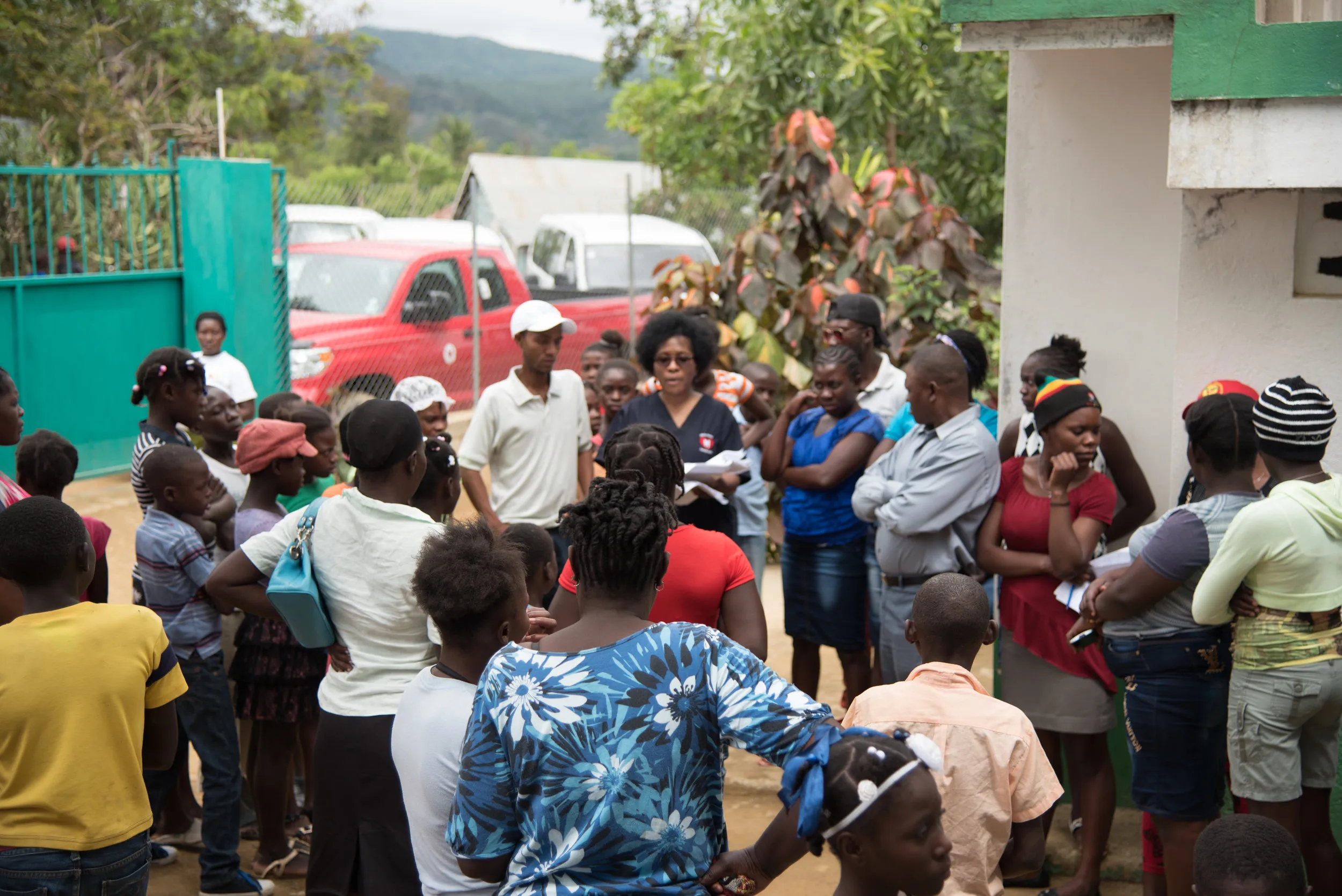 The community gathers outside the clinic