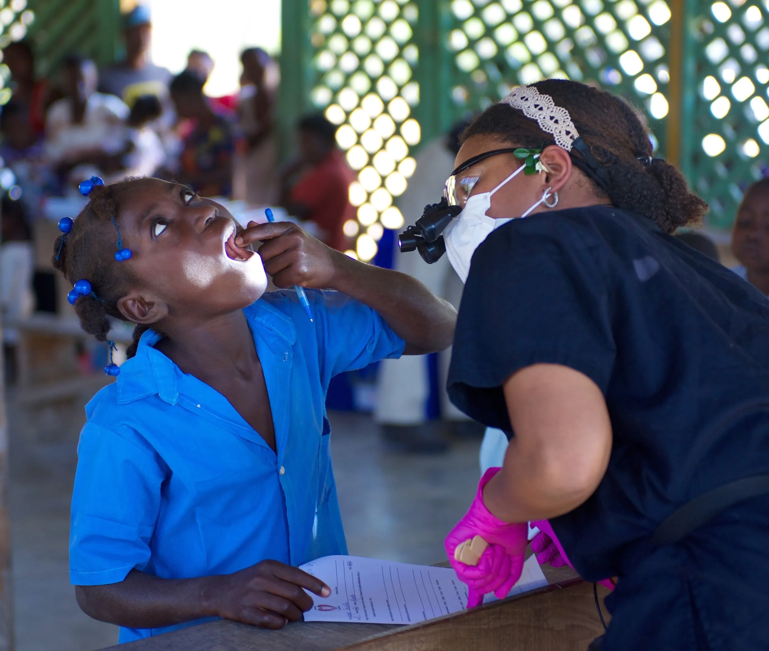 A dental screening under the gazebo
