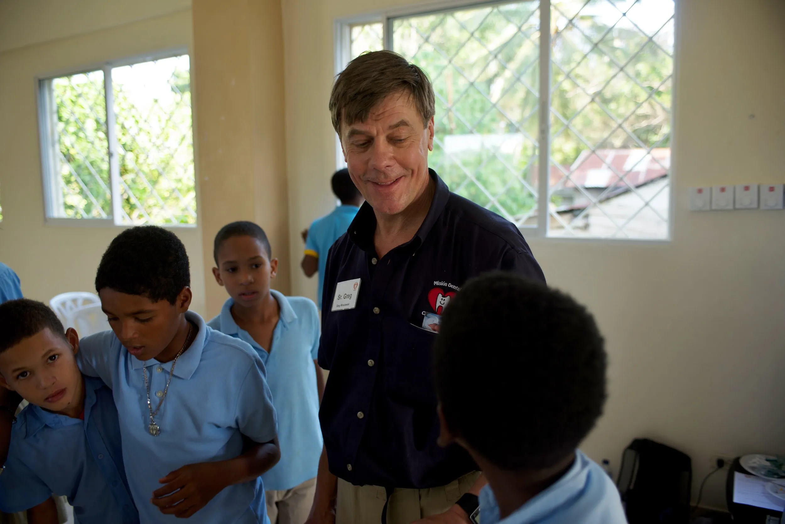 Greg Wroclawski talking with local boys